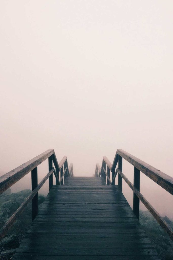 bridge in the midst of fog